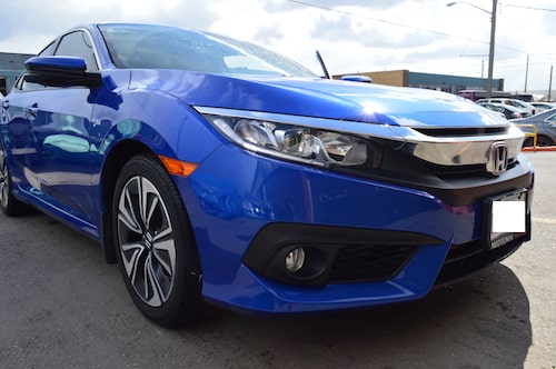 Honda civic bumper and quater panel  after repair at an auto body shop in toronto