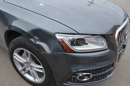 Audi steel fender before repair at an auto body shop in toronto 